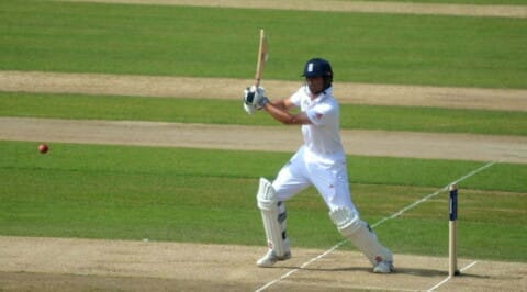 Alastair Cook cuts to mid wicket