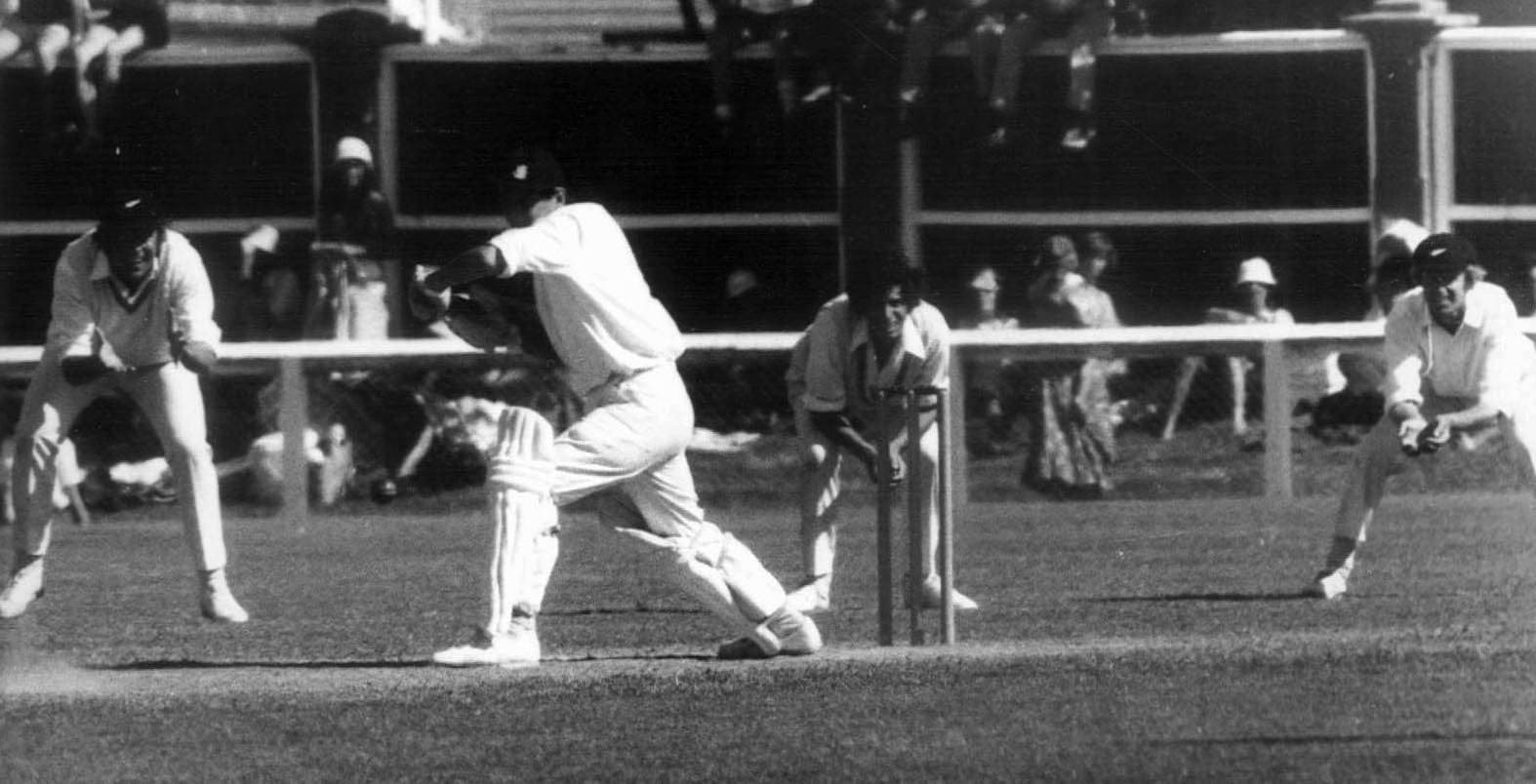 English batsman plays stroke with NZ slips in background