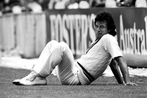 Imran Khan sitting in outfield